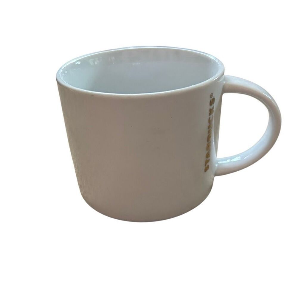 Starbucks 2012 16oz White Mug With Gold Letters And Red Bottom Rim